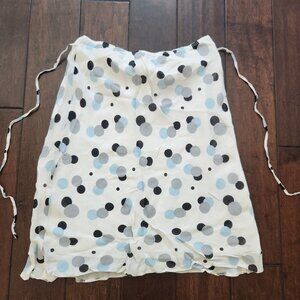 White skirt with black, blue and gray dots